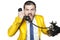 Businessman in a gold suit negotiates by phone