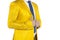 Businessman in a gold suit stands profile