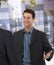 Businessman greeting colleague at office