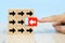 Businessman hand choose red wooden toy blog with arrow icons concept.