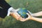 Businessman hand giving Earth globe to little boy as Earth day concept. Gyre