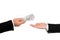 Businessman hand handing over money to another hand  on white background