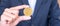 Businessman hand holding golden Dash cryptocurrency coin, Crypto is Digital Money within the blockchain network, is exchanged