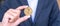 Businessman hand holding golden ZCASH ZEC cryptocurrency coin, Crypto is Digital Money within the blockchain network, is