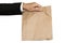 Businessman hand holding(Sharing,giving) brown paper bag lunch, isolated on white background