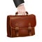 Businessman hand holds leather briefcase