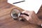 Businessman hand magnifier and coins