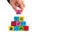 Businessman hand take wooden cube with shopping sales icon
