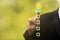 Businessman hand touching and pointing right choice, best option on blurred green background. Strategy of choice. Business