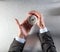 Businessman hands holding a compass, managing his career orientation