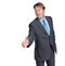 Businessman, handshake and suit with smile in studio for focus, deal and leadership by white background. Happy corporate