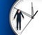 Businessman hangs on an arrow of clock