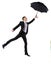 Businessman having fun with umbrella