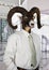 Businessman with Head of a Goat