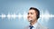 Businessman in headset over sound wave or diagram