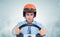 Businessman in a helmet with steering wheel