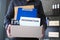Businessman hold boxes for personal belongings and resignation letters