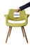 Businessman hold paper note to reserve modern green armchair wo