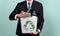 Businessman hold recycle bin promoting sustainable clean environment. Reliance