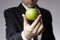 Businessman holding apple