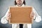 Businessman holding blank bulletin board