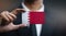 Businessman Holding Card of Bahrain Flag