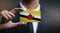 Businessman Holding Card of Brunei Flag