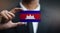 Businessman Holding Card of Cambodia Flag