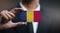 Businessman Holding Card of Chad Flag