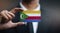 Businessman Holding Card of Comoros Flag
