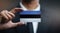 Businessman Holding Card of Estonia Flag