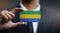 Businessman Holding Card of Gabon Flag