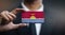 Businessman Holding Card of Kiribati Flag