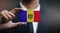 Businessman Holding Card of Moldova Flag