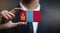 Businessman Holding Card of Mongolia Flag