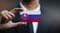 Businessman Holding Card of Slovakia Flag