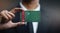 Businessman Holding Card of Turkmenistan Flag