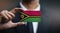 Businessman Holding Card of Vanuatu Flag