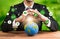 Businessman holding Earth with eco friendly icon design. Reliance