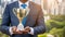 businessman holding a golden trophy