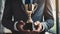 businessman holding a golden trophy