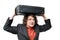 Businessman holding luggage above head