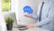 Businessman holding a message icon, bubble talk notification sign in his hands. Chat icon, sms icon, comments icon, speech bubbles