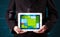 Businessman holding a tablet with modern software operational system