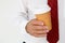 Businessman holding takeout coffee cup