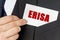 Businessman holds a card with the text - ERISA