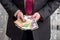 Businessman holds pack of dollars and euros