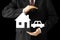 Businessman - house and car insurance concept