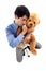 Businessman hugging teddy bear