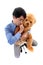 Businessman hugging a teddy bear.